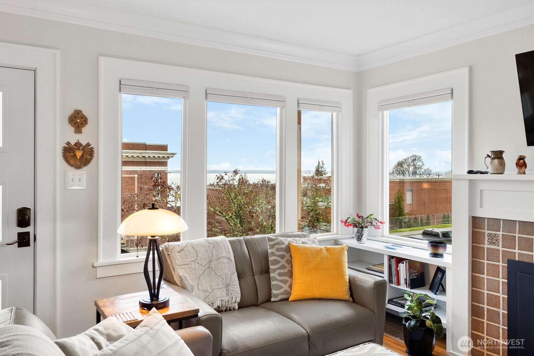 925 15th Street Bellingham, WA 98225 - Photo 6 of 40 a living room with furniture and a floor to ceiling window