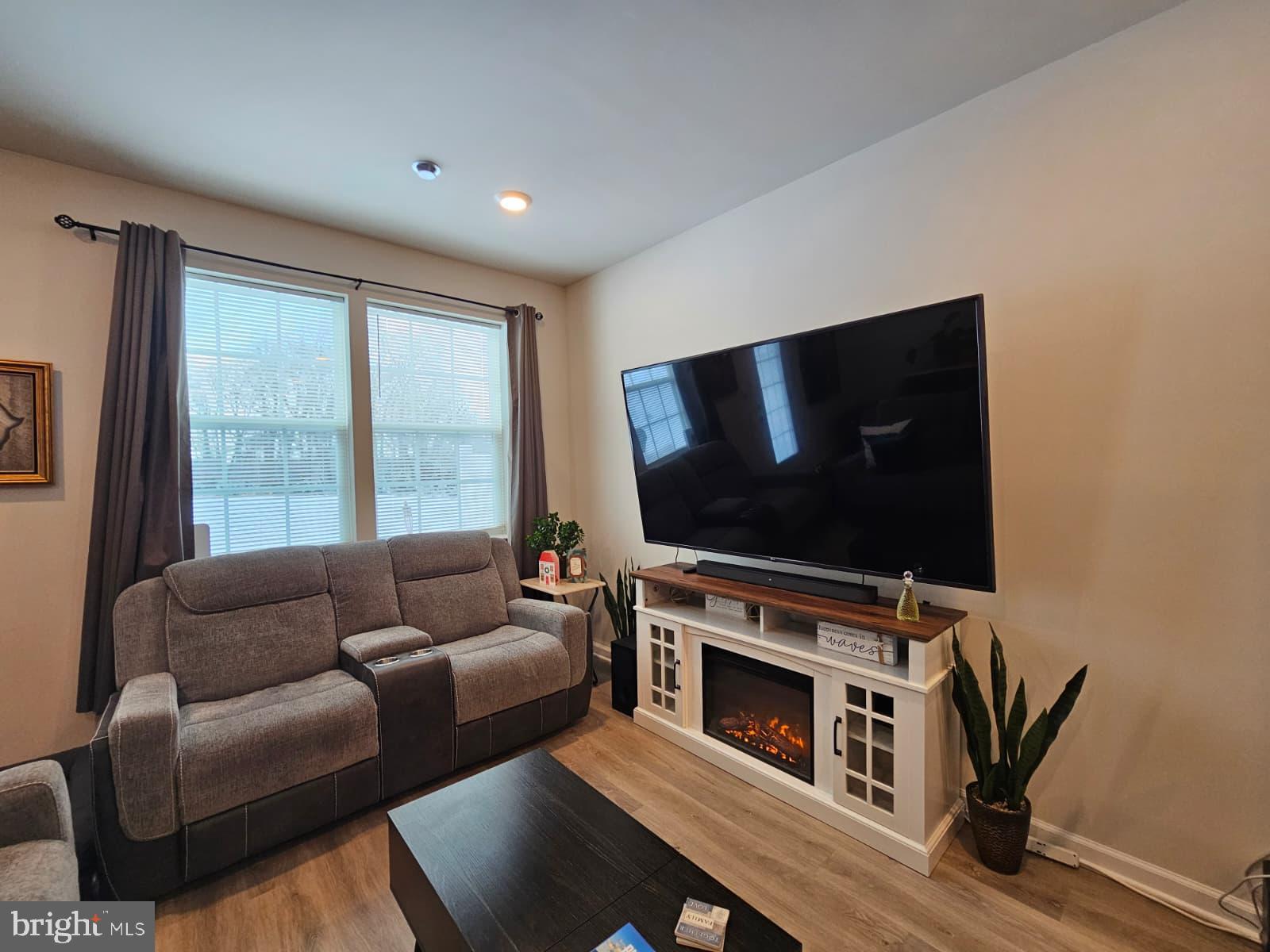 33 Alexander Way Westampton, NJ 08060 - Photo 6 of 18 a living room with furniture and a flat screen tv