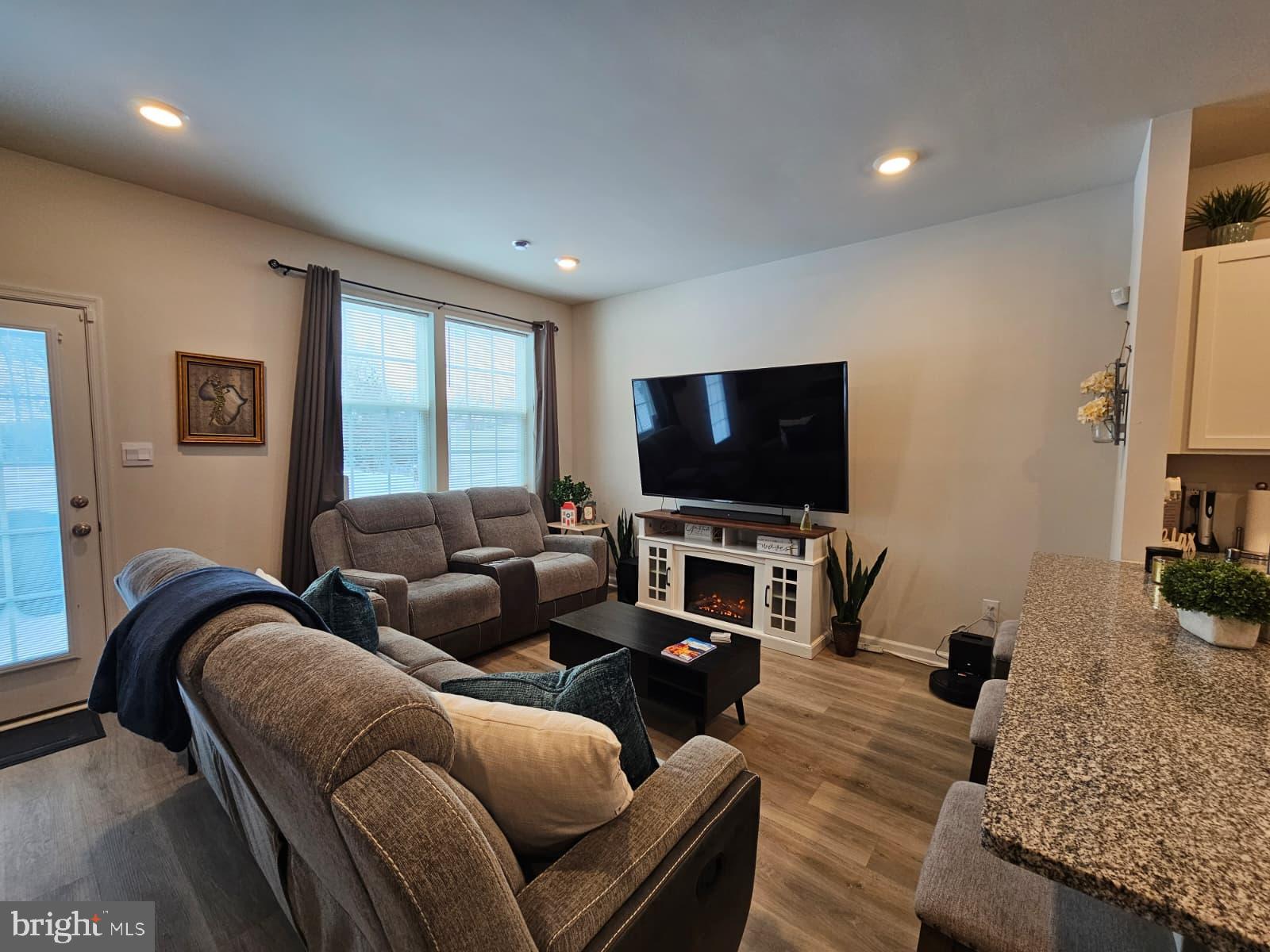 33 Alexander Way Westampton, NJ 08060 - Photo 7 of 18 a living room with furniture and a flat screen tv