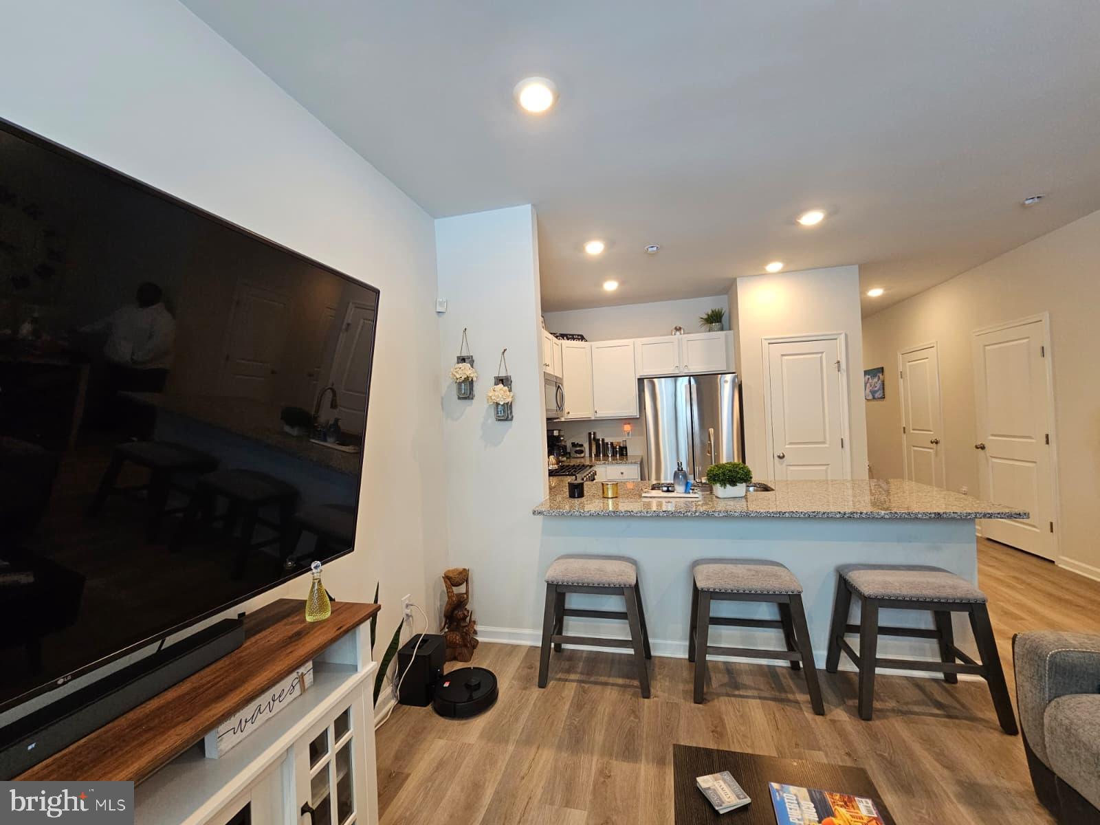 33 Alexander Way Westampton, NJ 08060 - Photo 8 of 18 a kitchen with stainless steel appliances granite countertop a refrigerator and a stove top oven