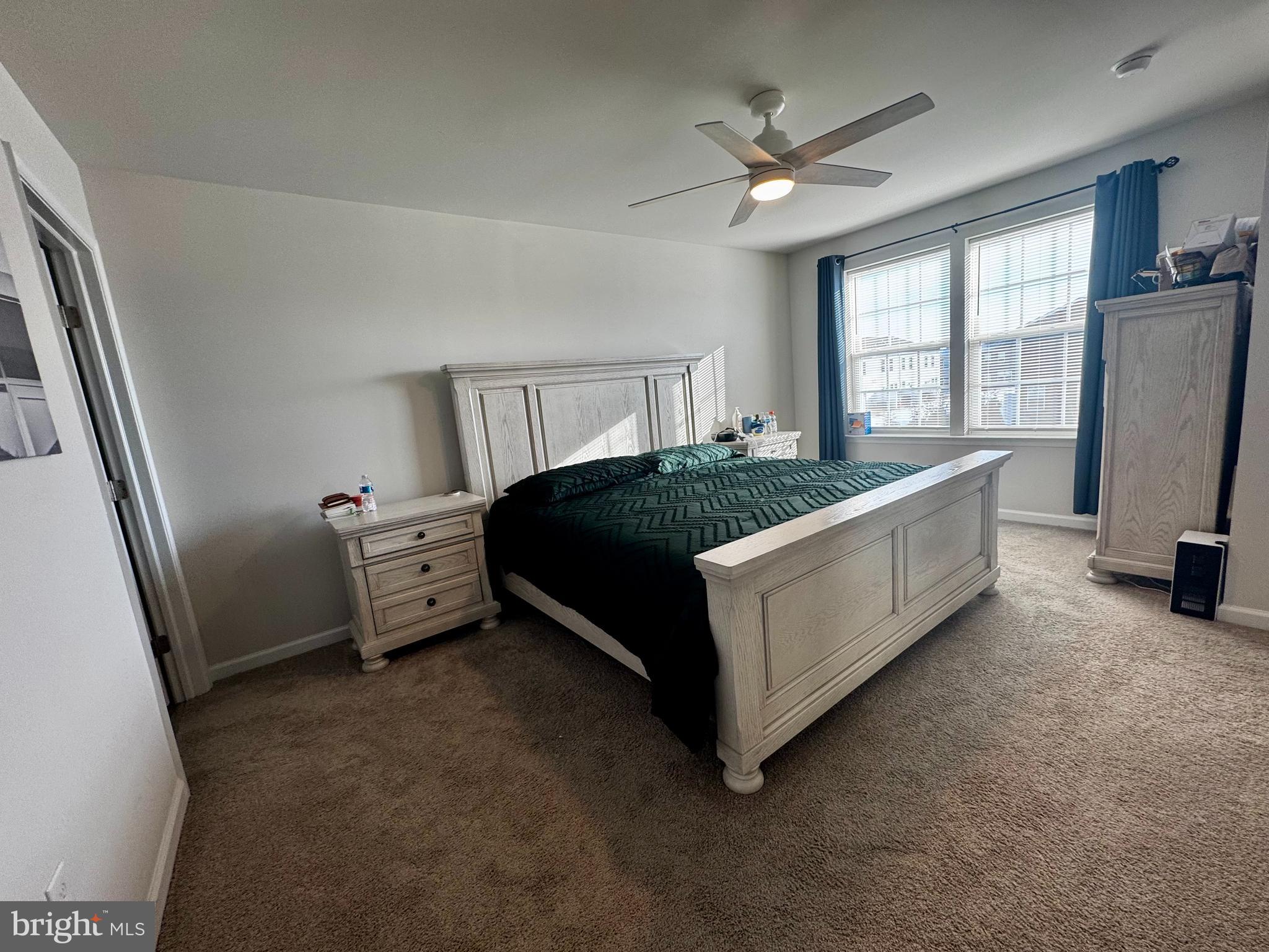 33 Alexander Way Westampton, NJ 08060 - Photo 10 of 18 a bedroom with a bed dresser and a large window