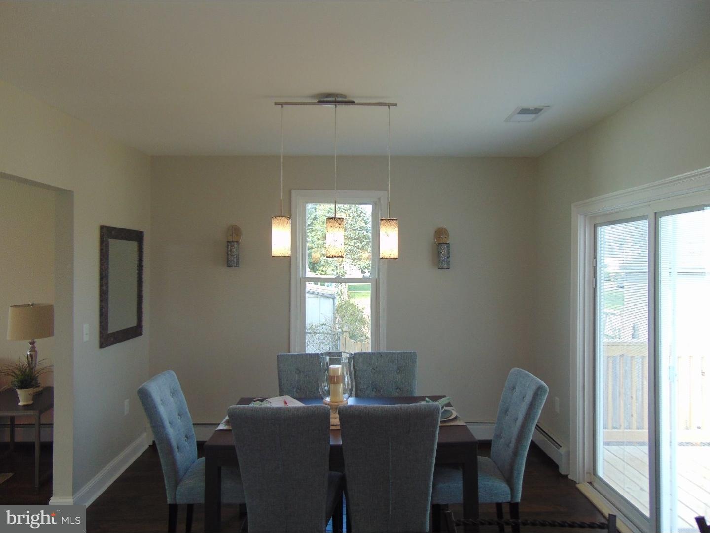 124 Ronald Road Aston, PA 19014 - Photo 8 of 25 a view of a dining room with furniture and windows