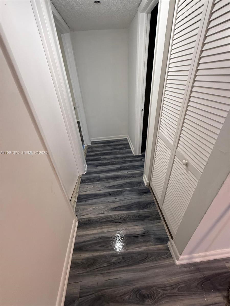 7210 Northwest 179th Street, Unit 203 Hialeah, FL 33015 - Photo 13 of 16 a view of entryway