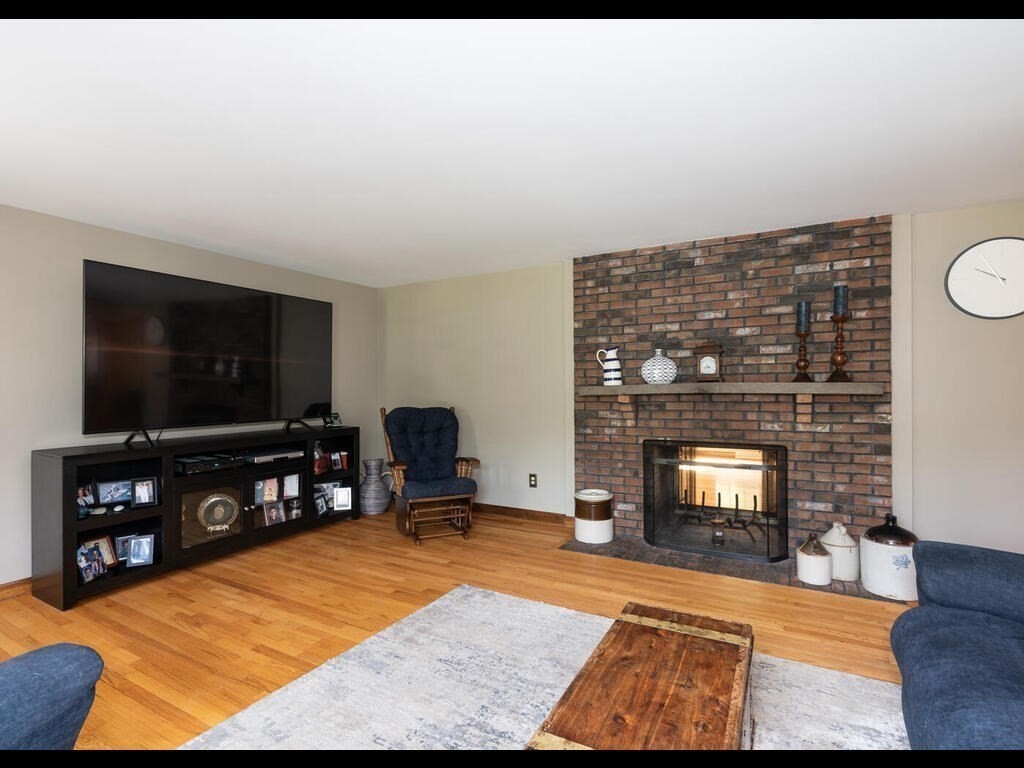 151 Ames Road Hampden, MA 01036 - Photo 15 of 41 a living room with furniture and a flat screen tv