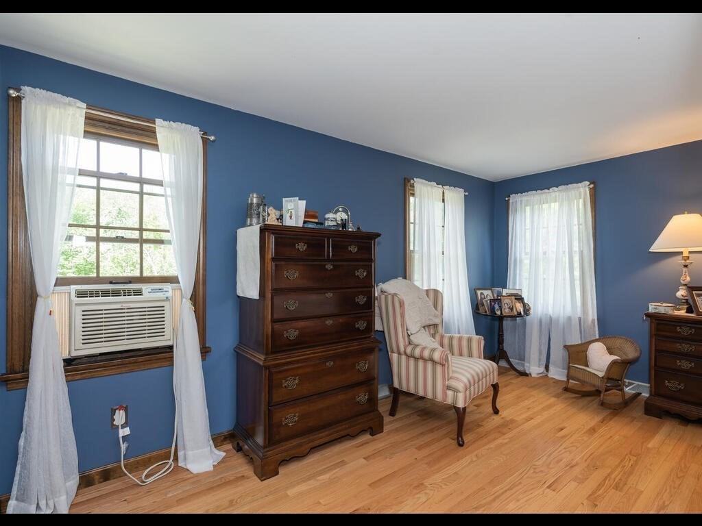 151 Ames Road Hampden, MA 01036 - Photo 27 of 41 a bedroom with furniture and a window
