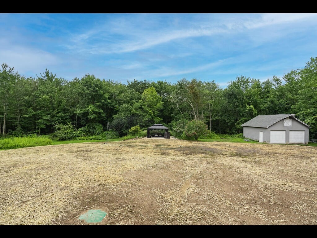 151 Ames Road Hampden, MA 01036 - Photo 39 of 41 a view of a yard with a house