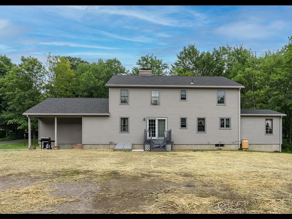 151 Ames Road Hampden, MA 01036 - Photo 41 of 41 a front view of a house with garden