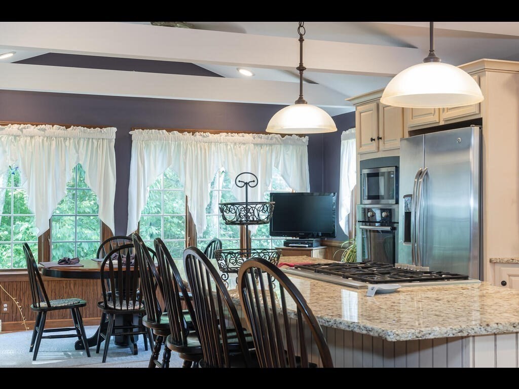 151 Ames Road Hampden, MA 01036 - Photo 5 of 41 a view of a dining room with furniture window and outside view