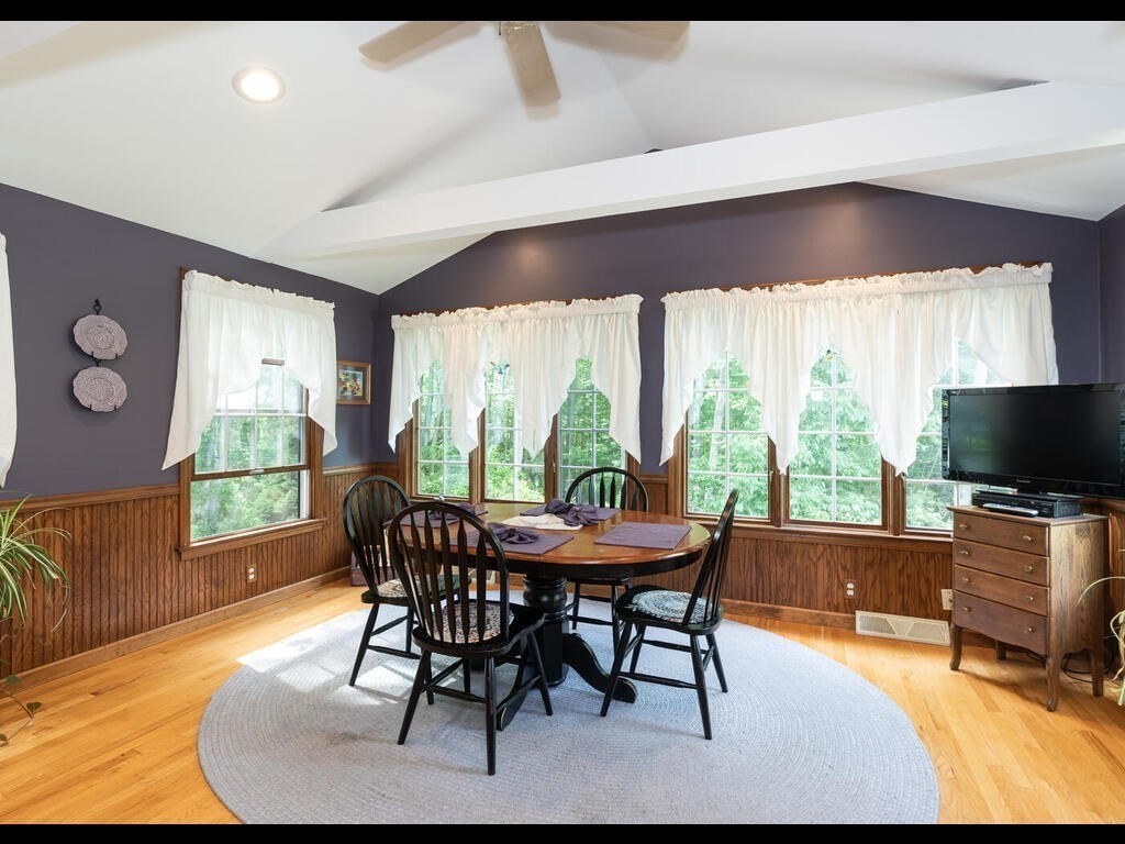 151 Ames Road Hampden, MA 01036 - Photo 7 of 41 a dining room with furniture and wooden floor