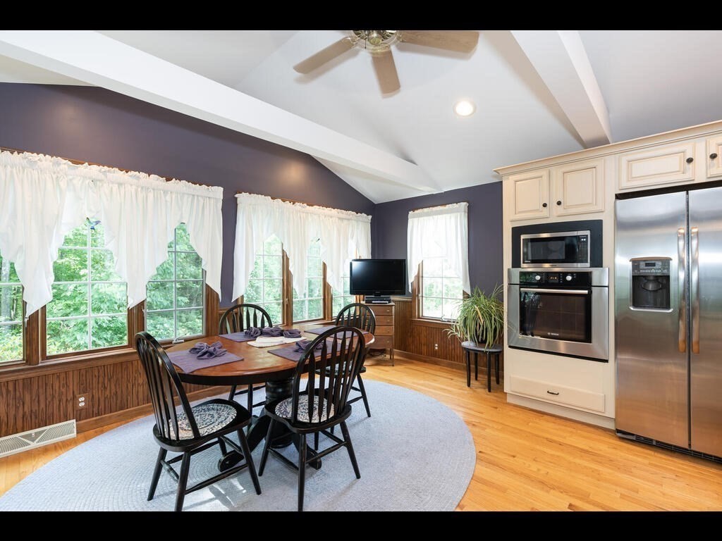151 Ames Road Hampden, MA 01036 - Photo 8 of 41 a view of a dining room with furniture window and outside view