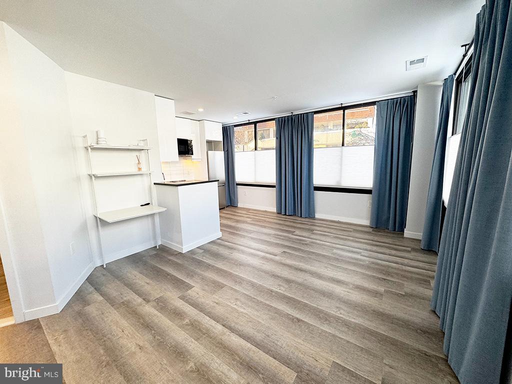 700 Roeder Road, Unit 103 Silver Spring, MD 20910 - Photo 5 of 20 Bright, airy space with modern elegance.