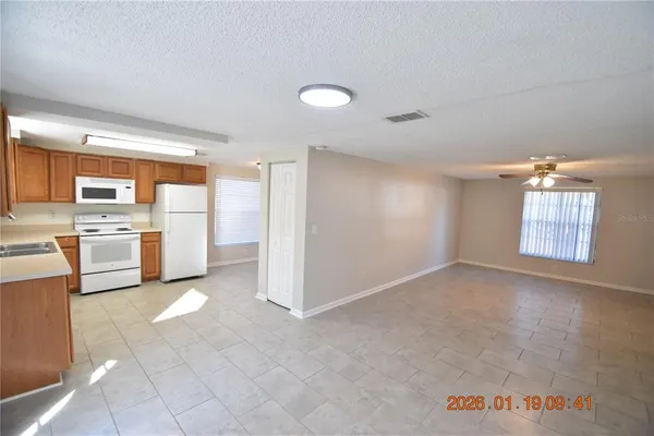 a view of a livingroom with furniture