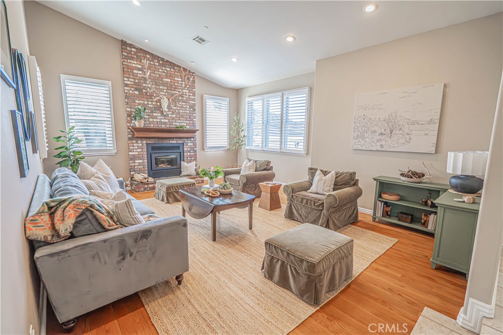 11340 Morgan Road Agua Dulce, CA 91390 - Photo 12 of 60 a living room with furniture and a fireplace