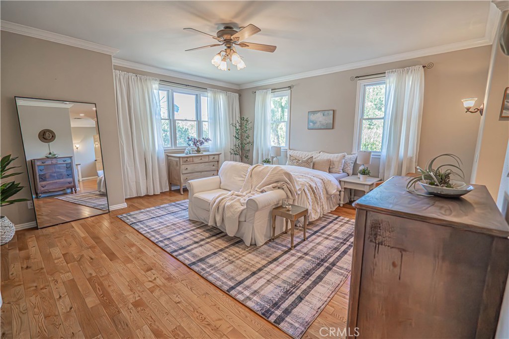 11340 Morgan Road Agua Dulce, CA 91390 - Photo 30 of 60 a bedroom with a large bed and a window