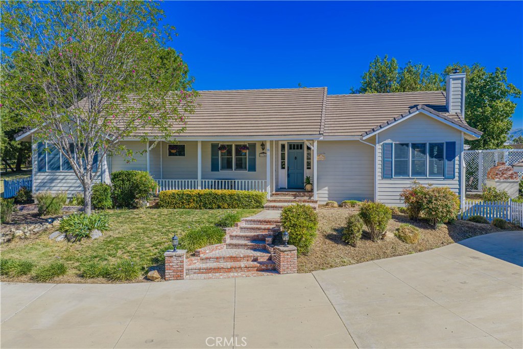 11340 Morgan Road Agua Dulce, CA 91390 - Photo 3 of 60 a front view of a house with a yard