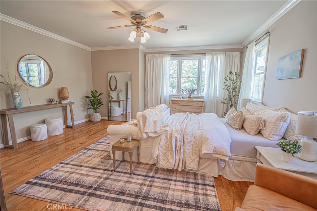 11340 Morgan Road Agua Dulce, CA 91390 - Photo 32 of 60 a living room with furniture a large window and a chandelier