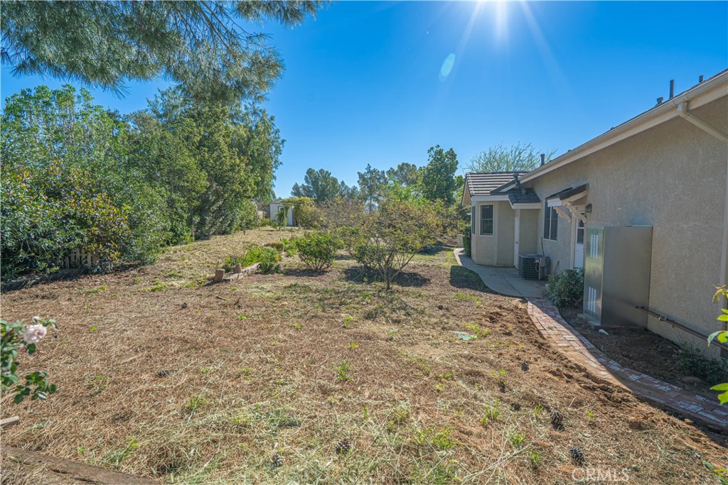 11340 Morgan Road Agua Dulce, CA 91390 - Photo 54 of 60 a backyard of a house with lots of green space