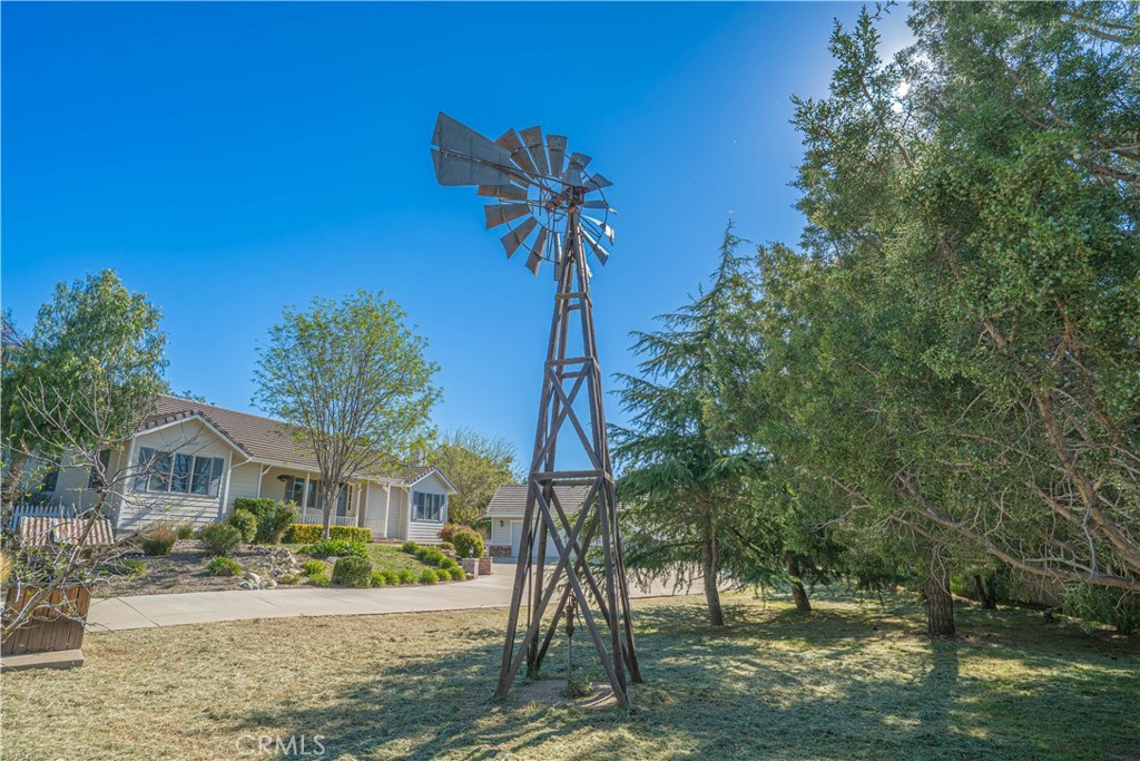 11340 Morgan Road Agua Dulce, CA 91390 - Photo 7 of 60 a front view of a house with a yard