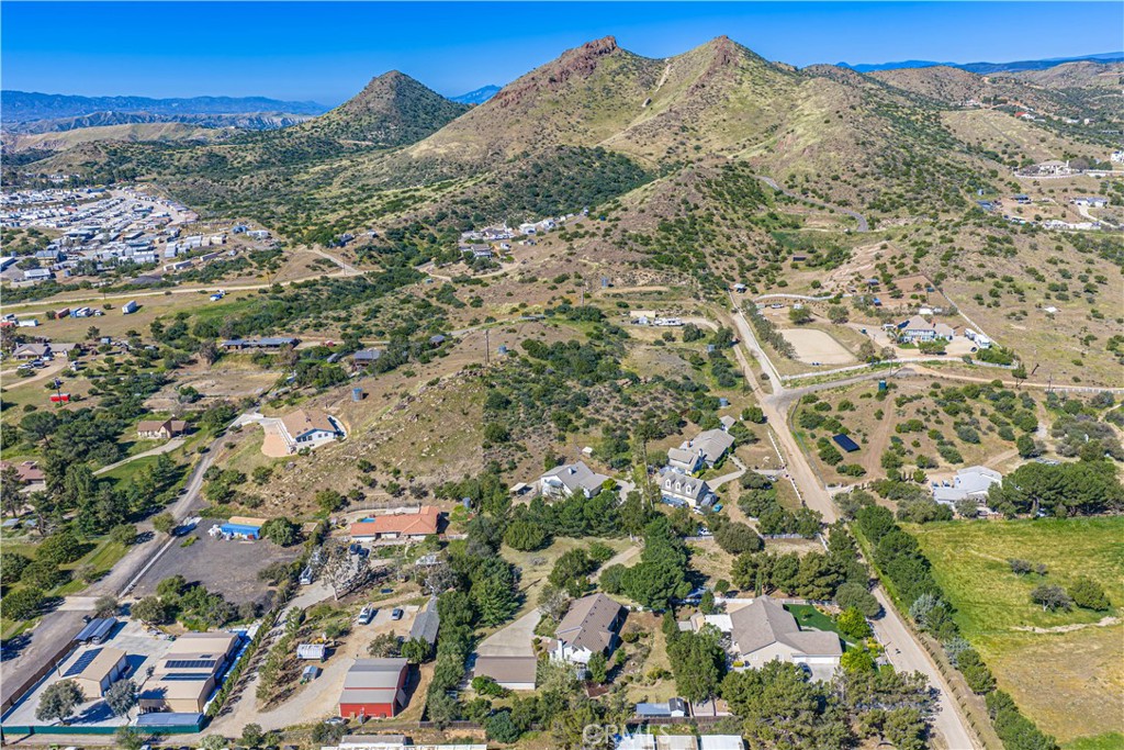 11340 Morgan Road Agua Dulce, CA 91390 - Photo 9 of 60 a view of a city with mountains in the background
