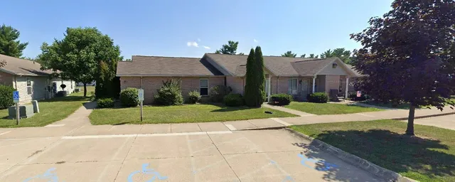 a house with garden in front of it