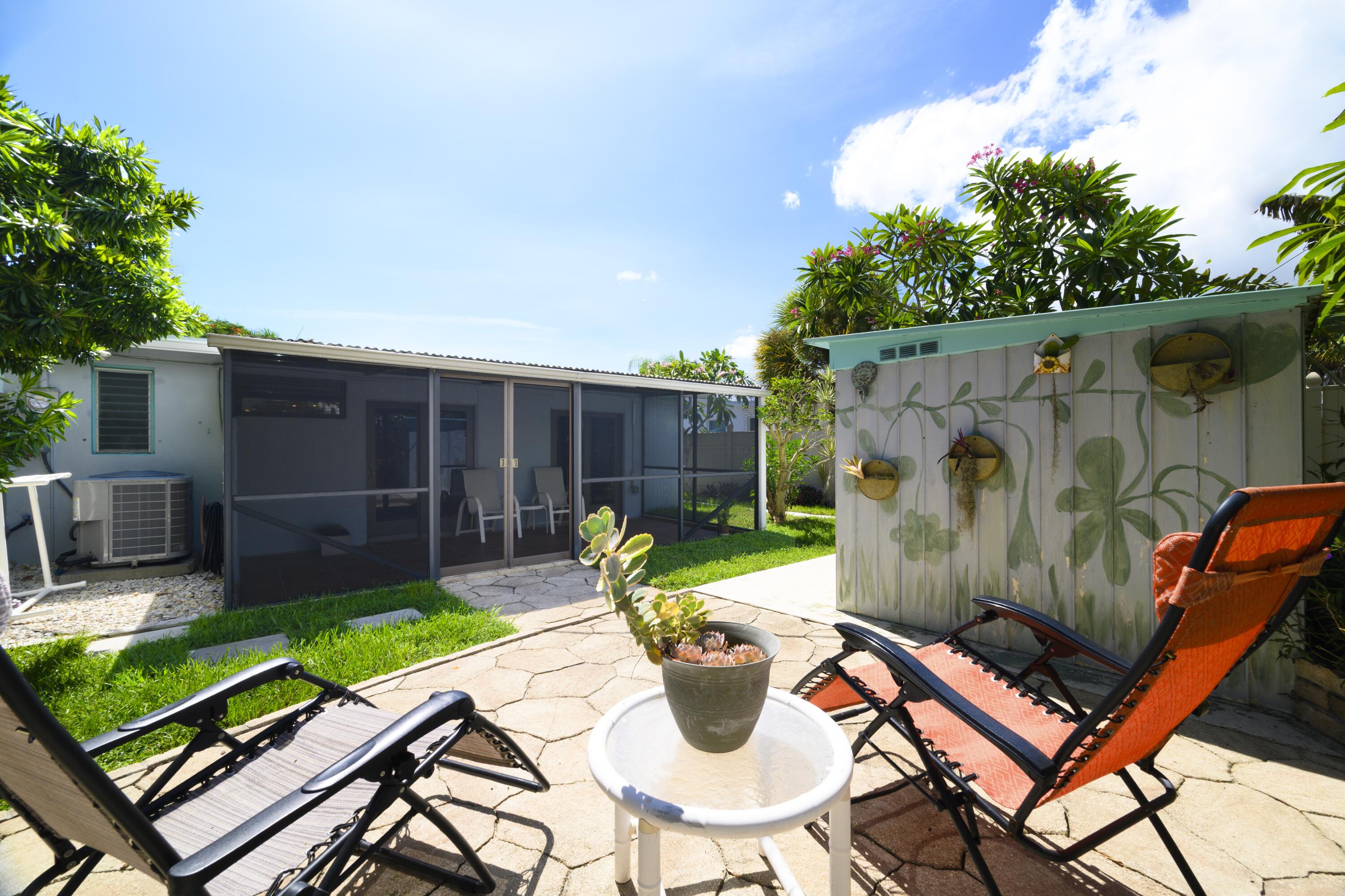 438 Southeast Fini Drive Stuart, FL 34996 - Photo 21 of 21 a view of a backyard with furniture and a backyard