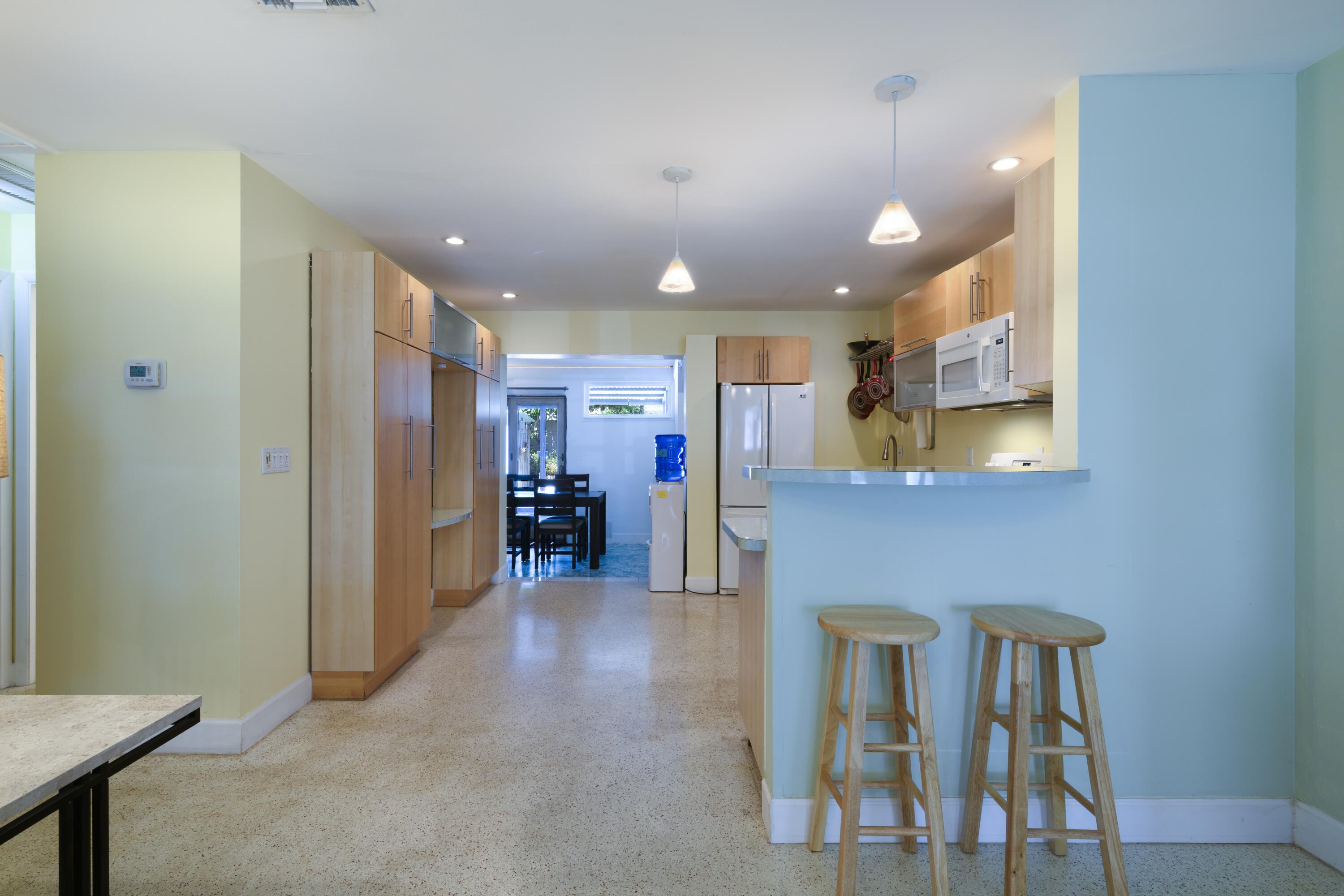 438 Southeast Fini Drive Stuart, FL 34996 - Photo 5 of 21 a view of a hallway with seating area