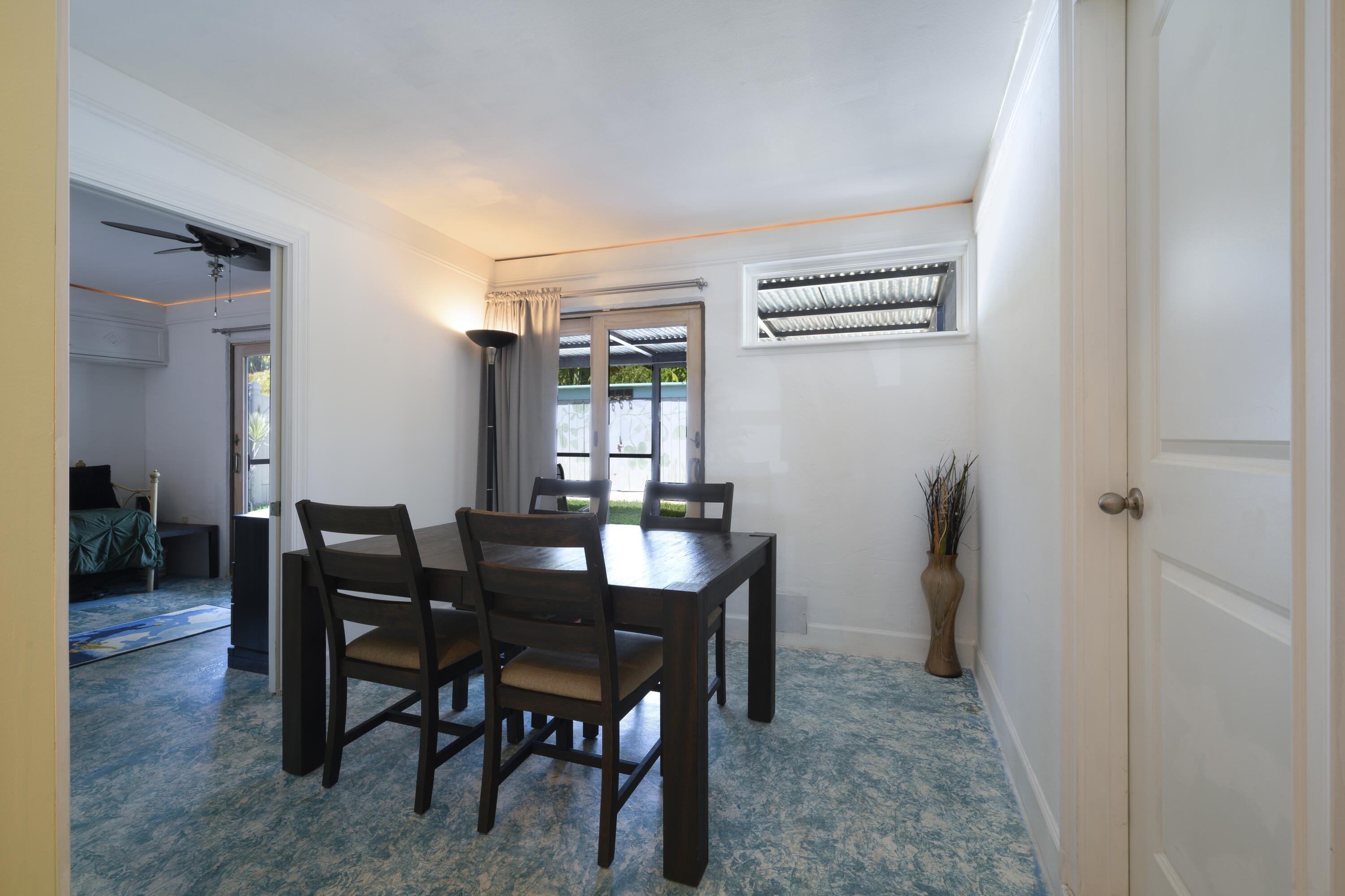438 Southeast Fini Drive Stuart, FL 34996 - Photo 7 of 21 a view of a dining room with furniture
