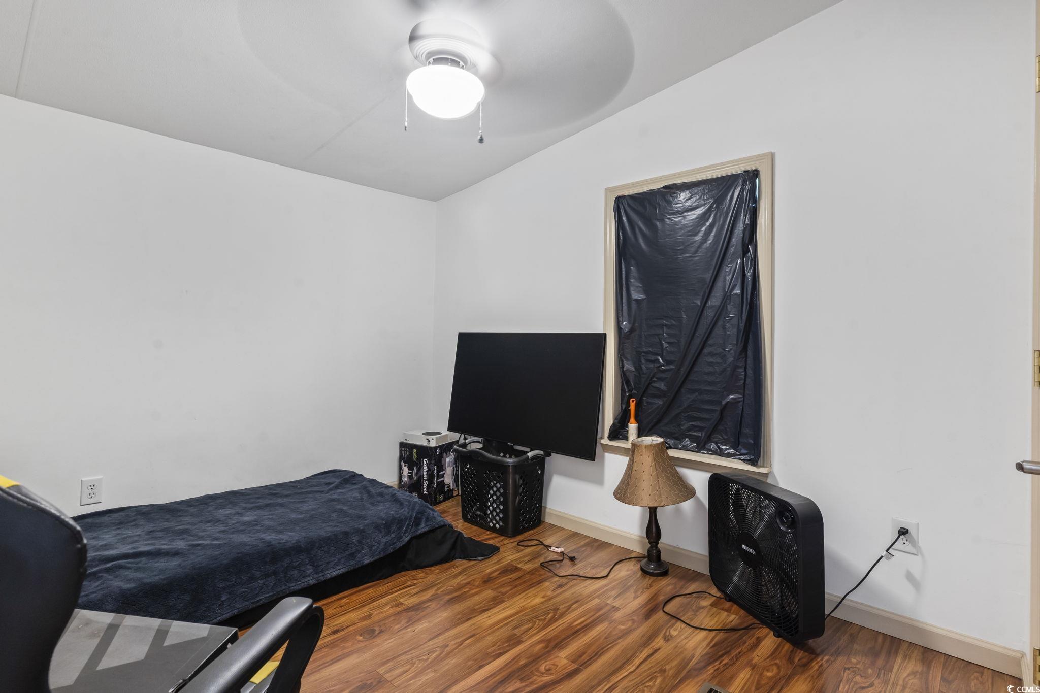 1585 Daisy Road Loris, SC 29569 - Photo 34 of 39 Bedroom with wood finished floors and ceiling fan