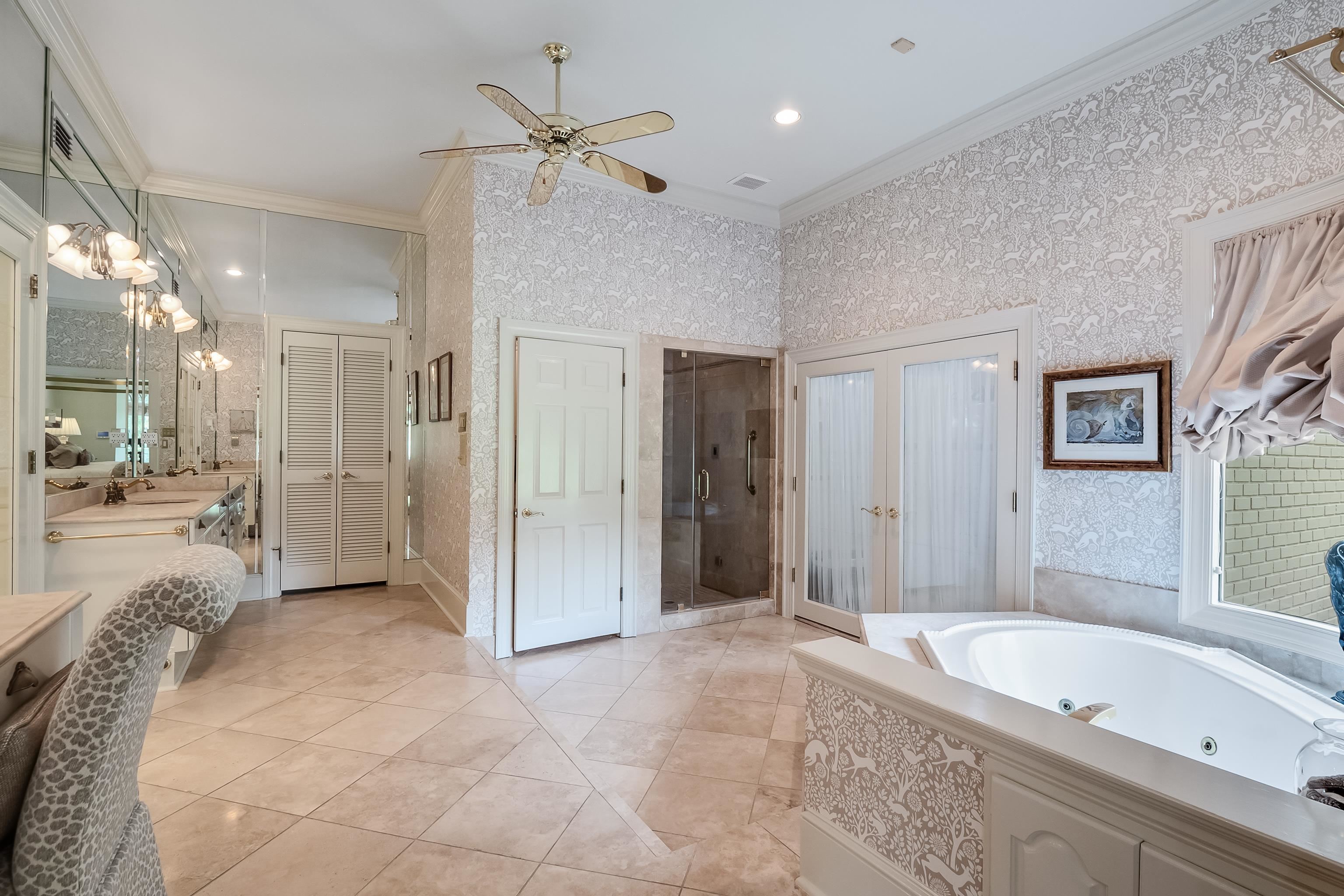 3044 Shea Road Collierville, TN 38017 - Photo 17 of 40 a large spacious bathroom with a large tub shower and sink