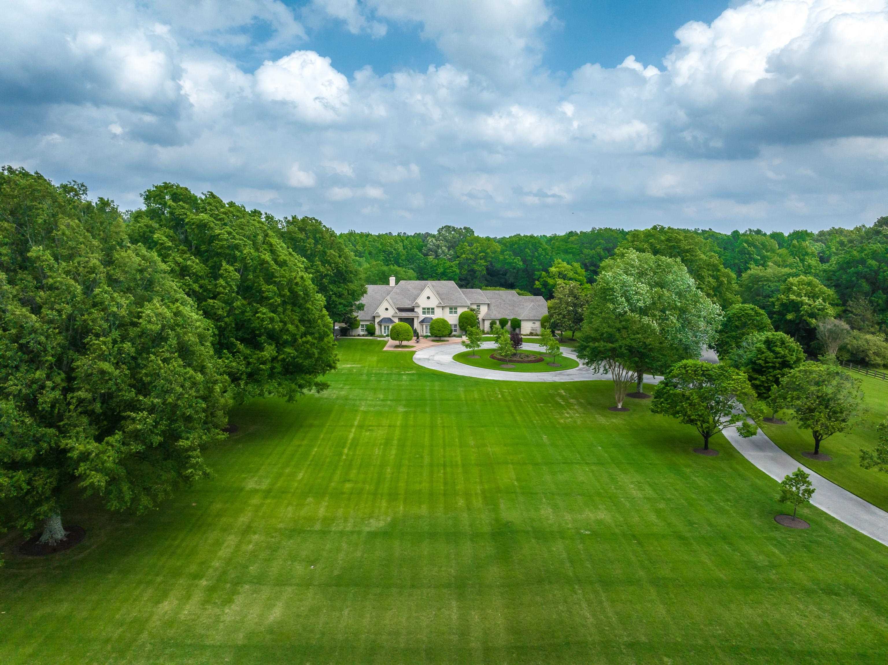 3044 Shea Road Collierville, TN 38017 - Photo 2 of 40 a view of a house with a big yard
