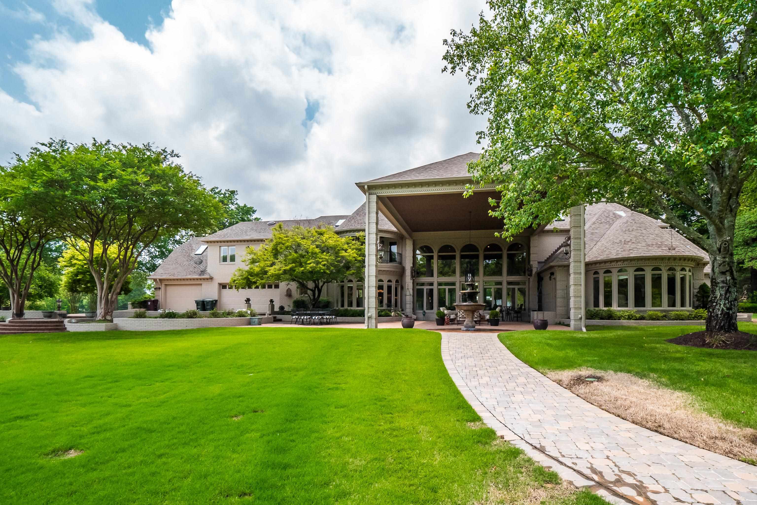 3044 Shea Road Collierville, TN 38017 - Photo 28 of 40 a view of a house with a yard and plants