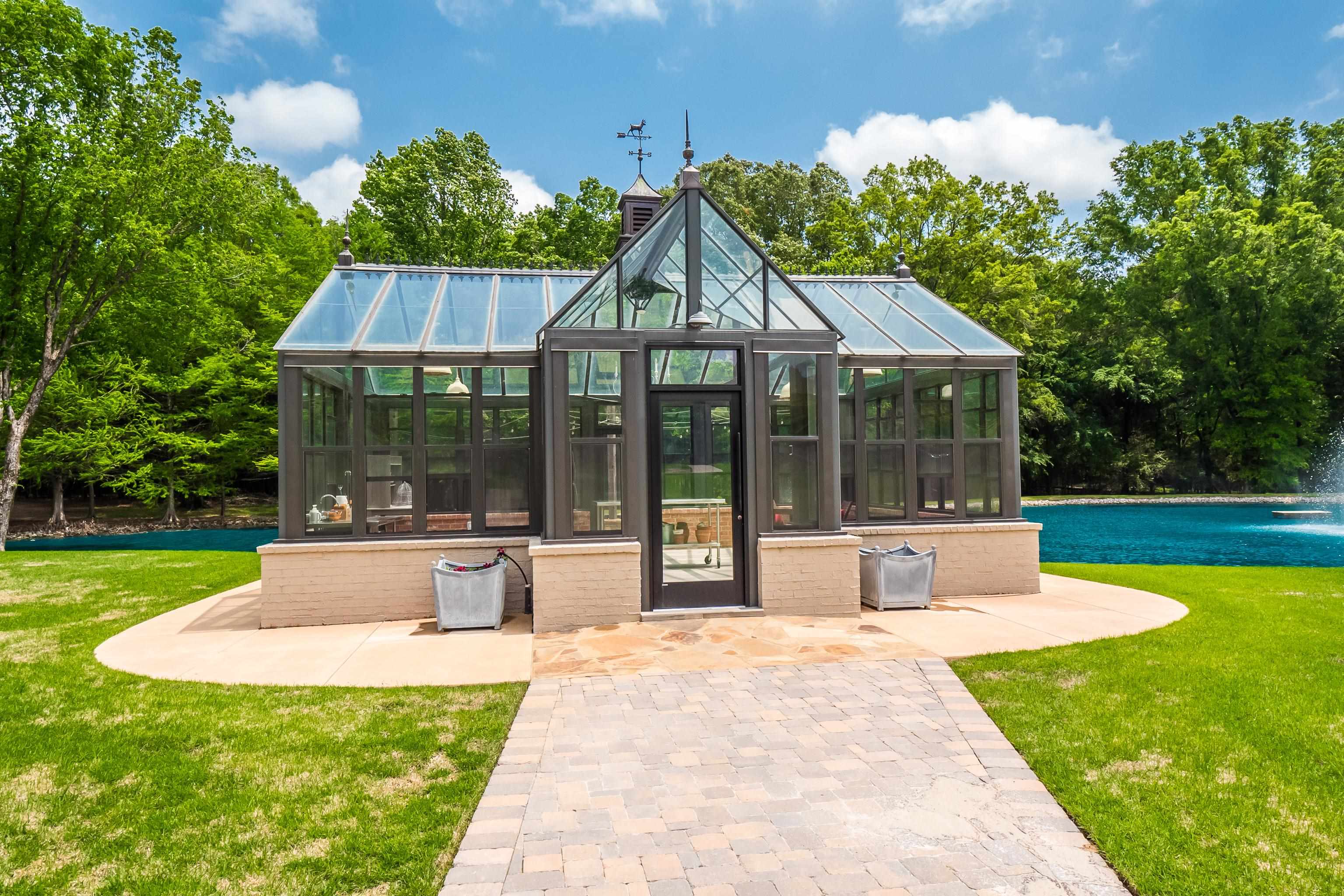 3044 Shea Road Collierville, TN 38017 - Photo 34 of 40 a view of a house with sitting area and garden