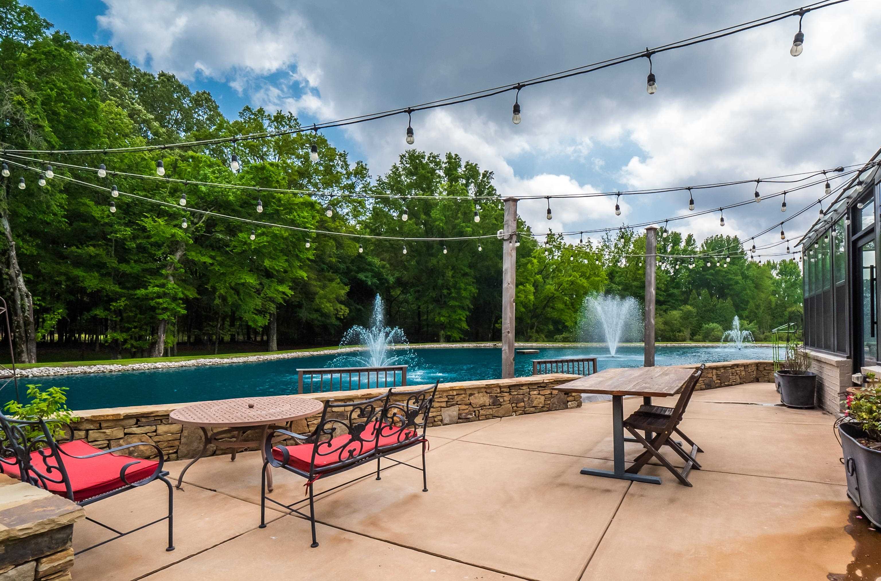 3044 Shea Road Collierville, TN 38017 - Photo 36 of 40 a view of a backyard with sitting area