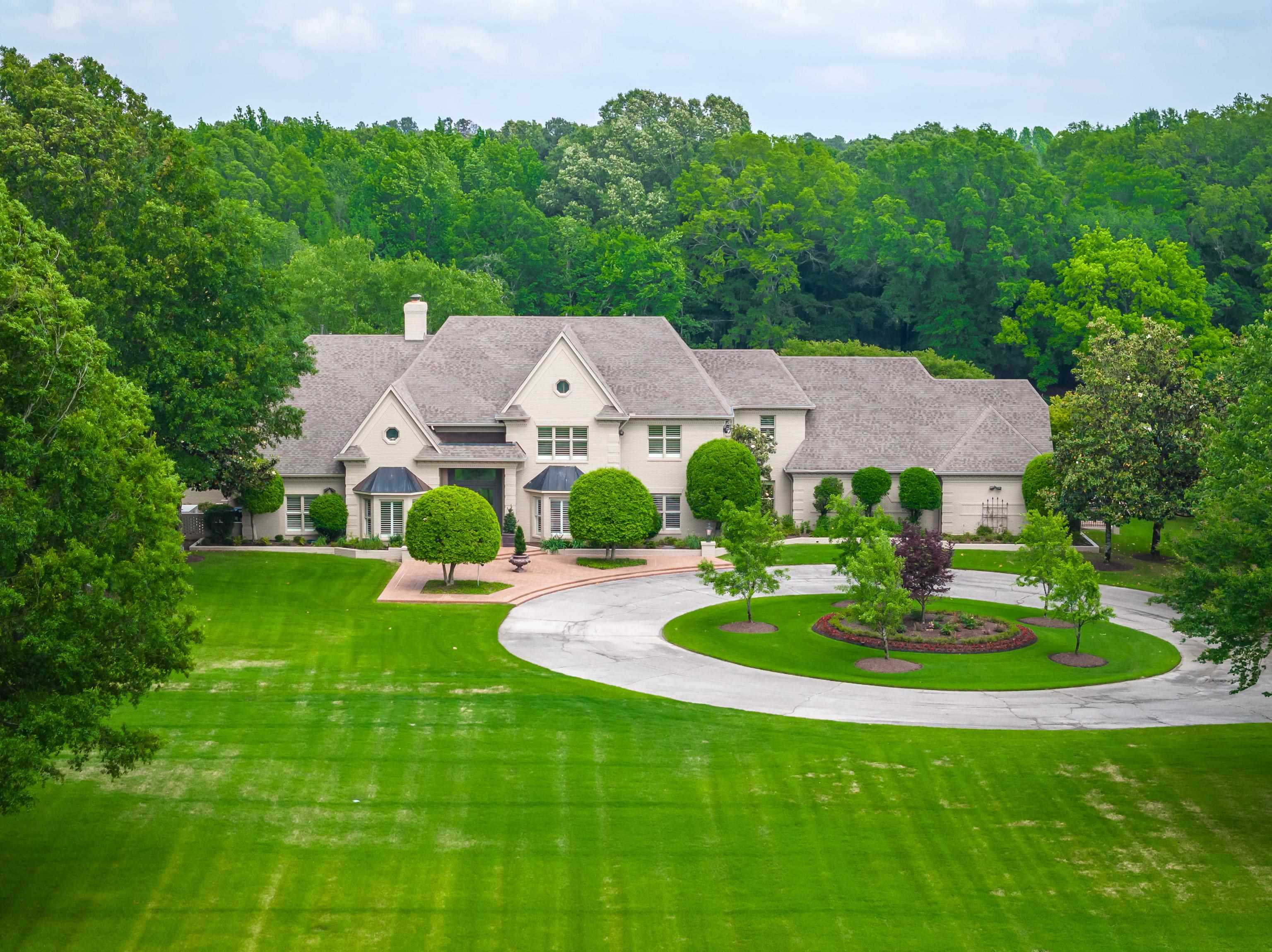 3044 Shea Road Collierville, TN 38017 - Photo 4 of 40 a aerial view of a house with garden