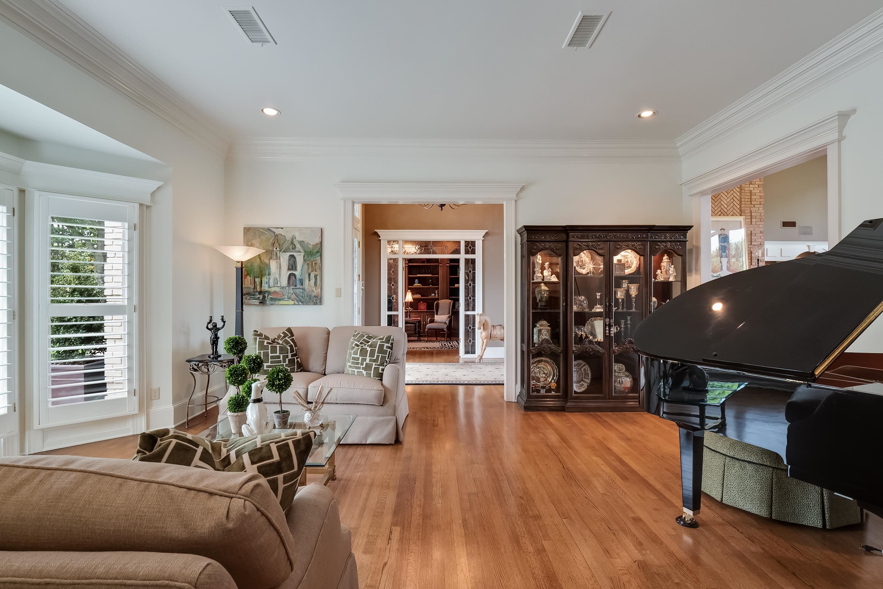 3044 Shea Road Collierville, TN 38017 - Photo 7 of 40 a living room with furniture and wooden floor