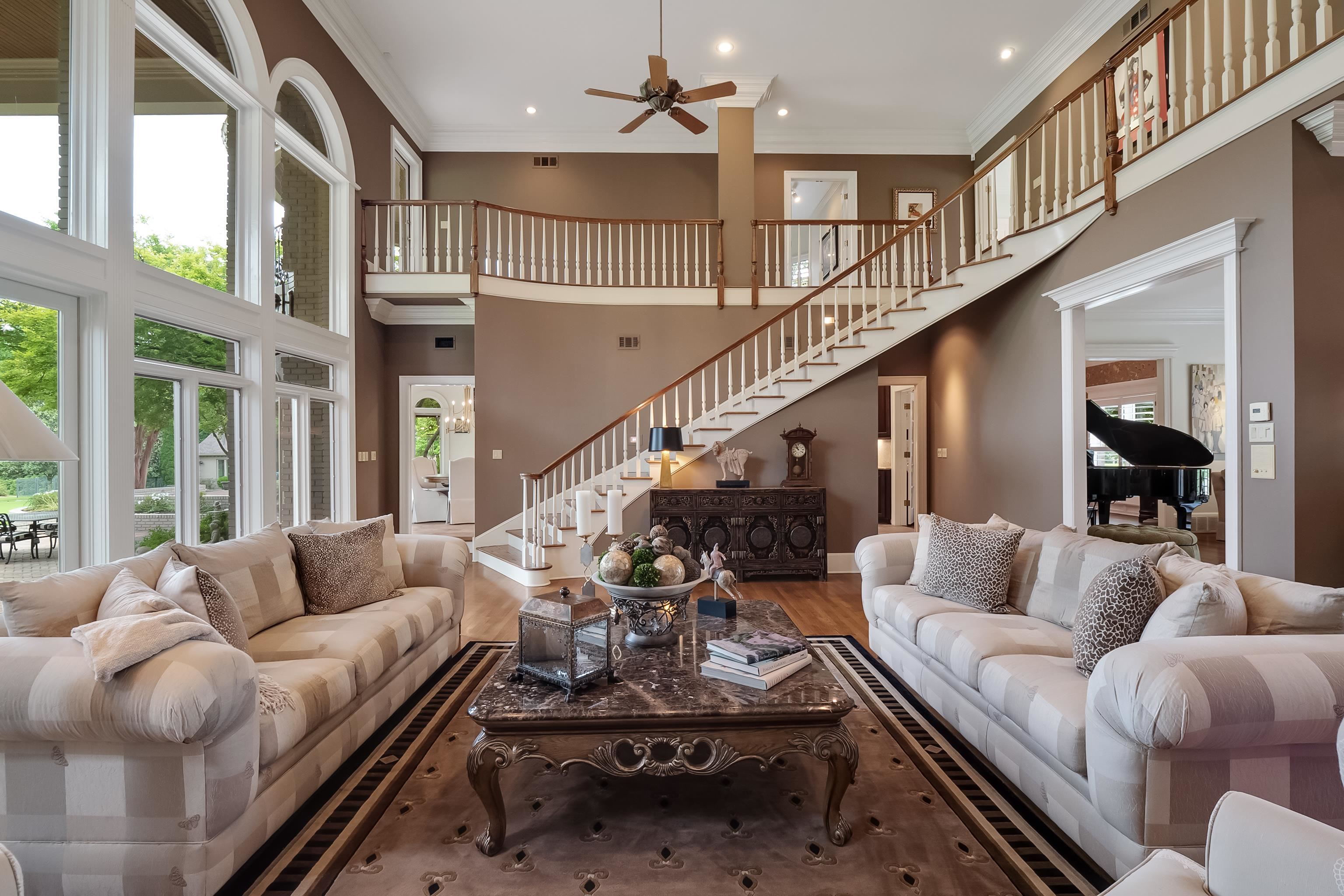 3044 Shea Road Collierville, TN 38017 - Photo 10 of 40 a living room with furniture or stairs and a couch