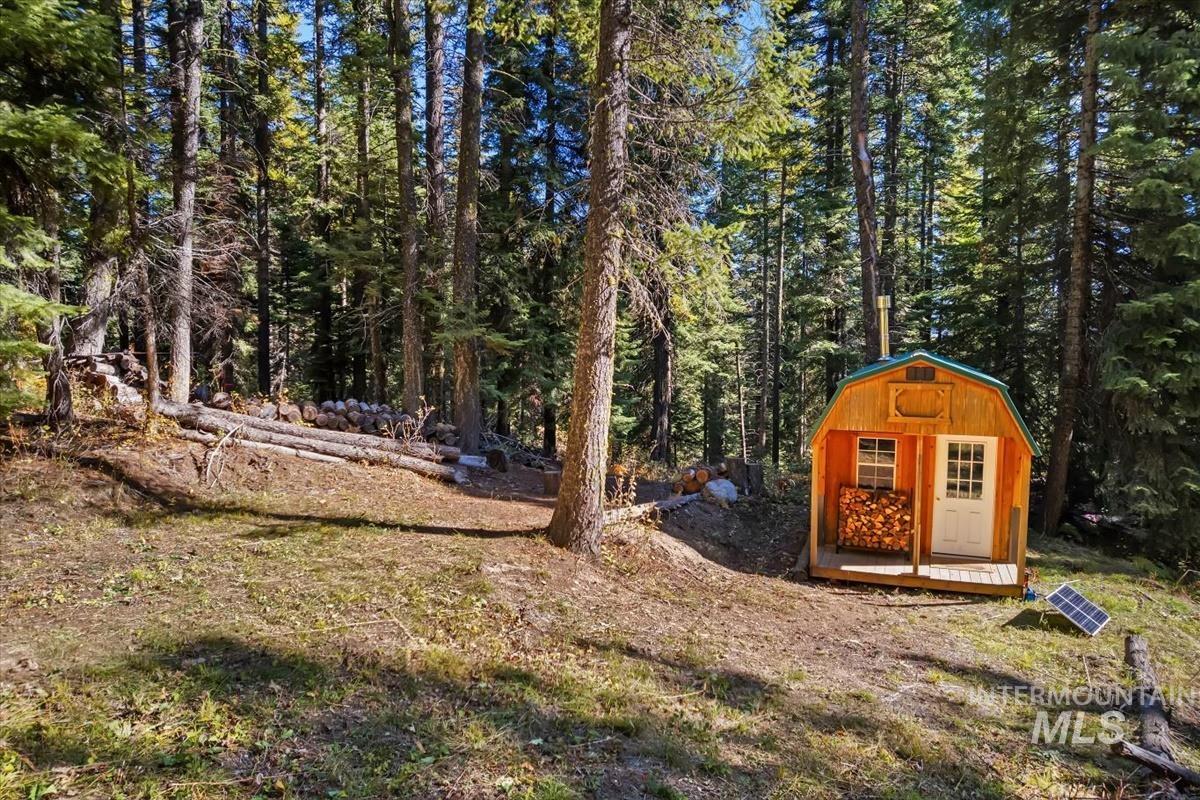 30 Arling Place Trial Cascade, ID 83611 - Photo 8 of 43 View of yard featuring a storage shed
