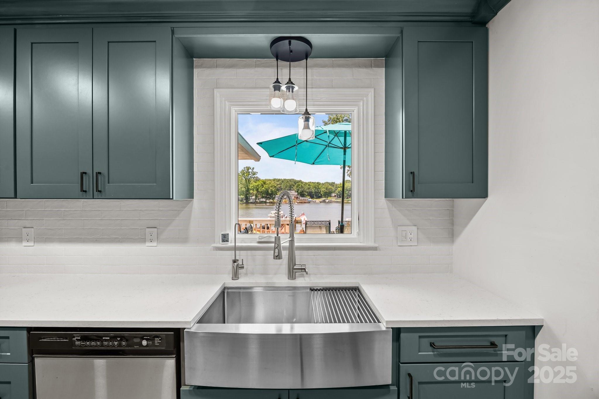 1017 Holloway Church Road Lexington, NC 27292 - Photo 12 of 48 a kitchen with a sink and a large window