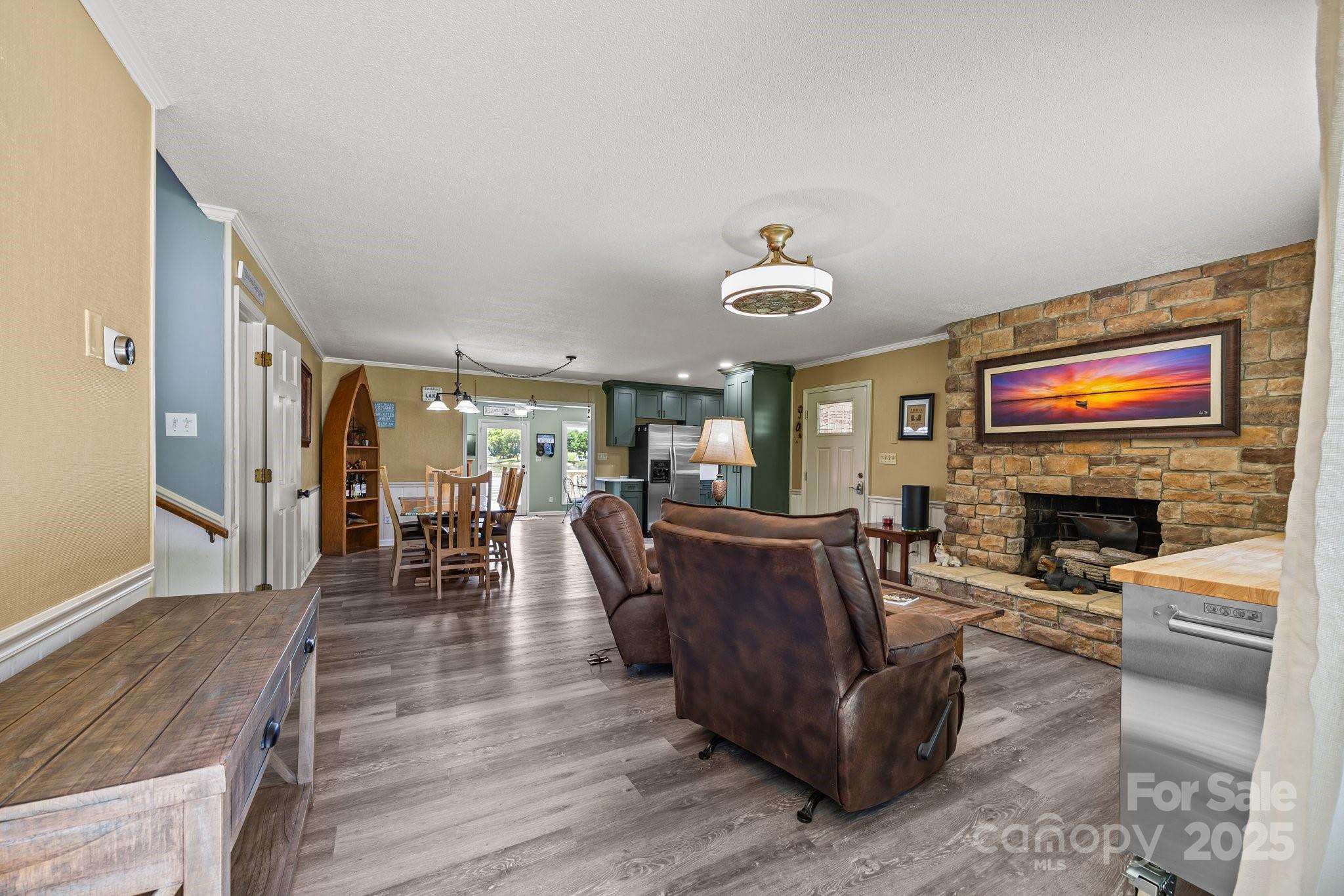 1017 Holloway Church Road Lexington, NC 27292 - Photo 16 of 48 a living room with furniture and a fireplace
