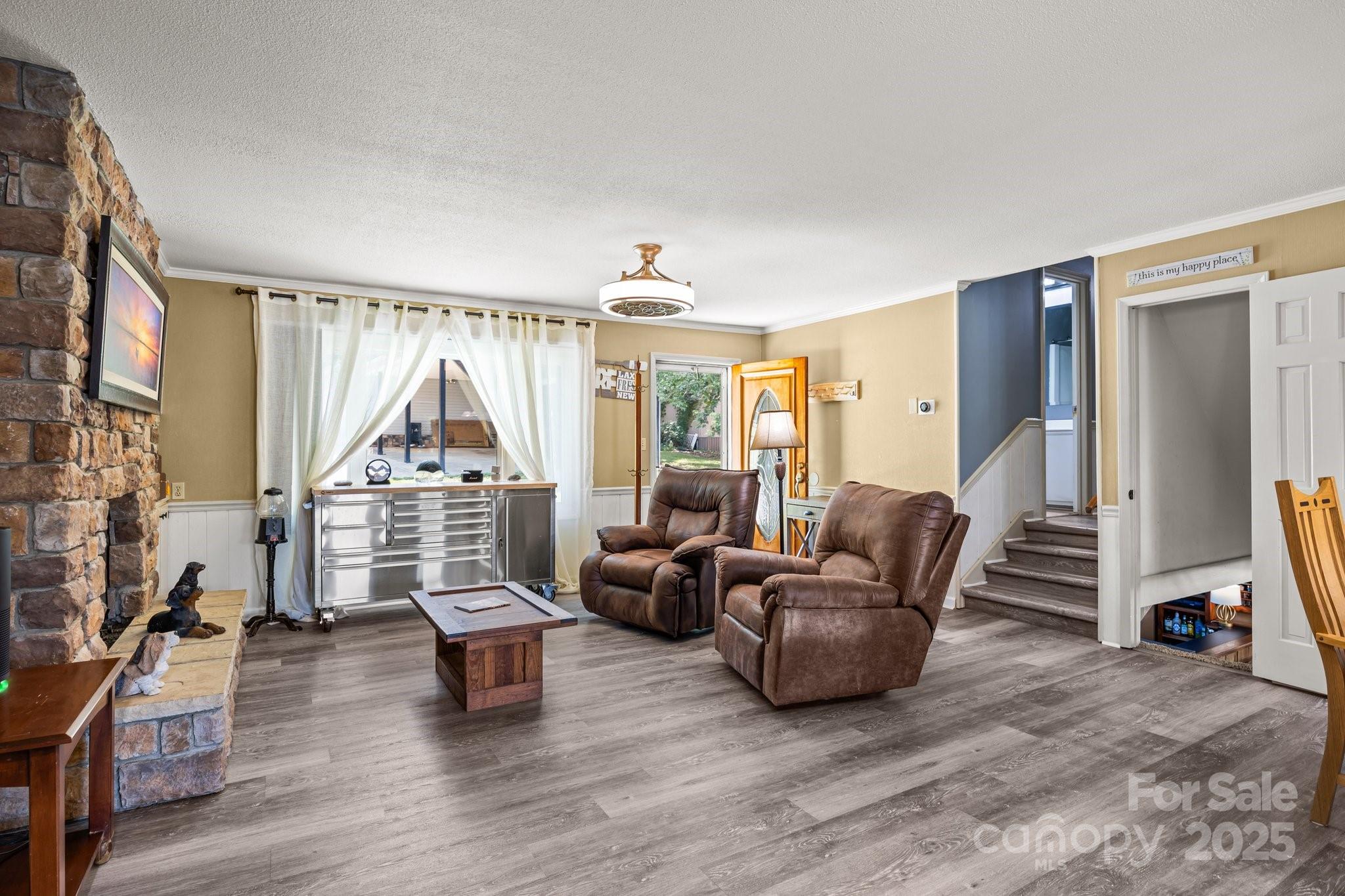 1017 Holloway Church Road Lexington, NC 27292 - Photo 18 of 48 a living room with furniture and a large window
