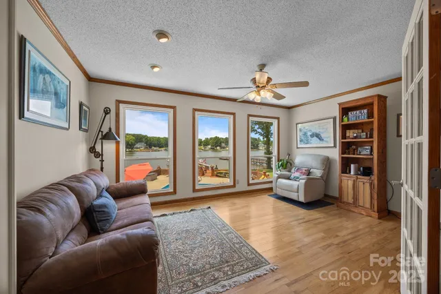 a living room with furniture or couch and a window
