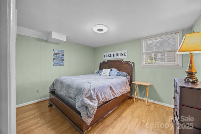 an aerial view of a house with roof deck front of house