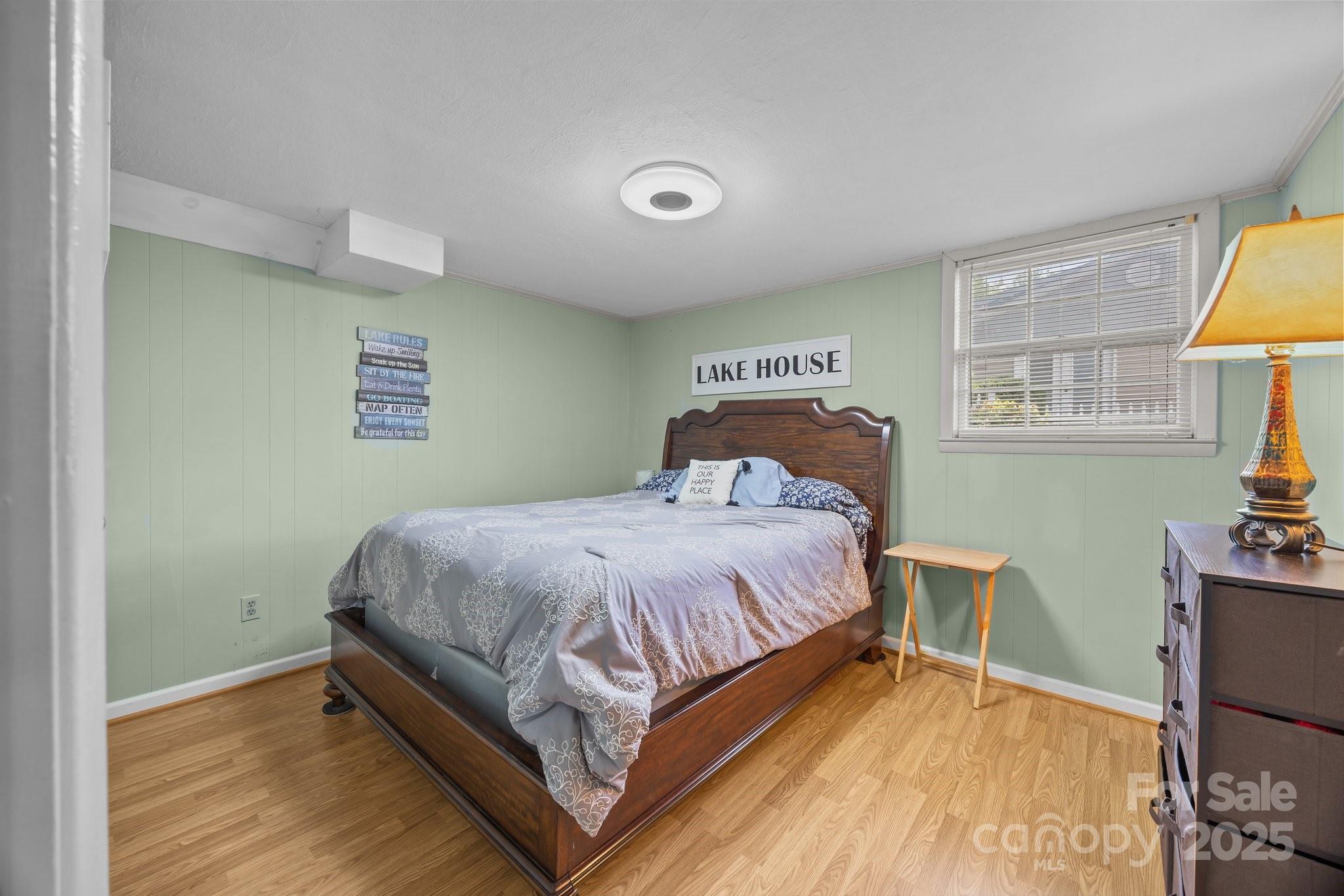 1017 Holloway Church Road Lexington, NC 27292 - Photo 33 of 48 a bedroom with a bed and a desk