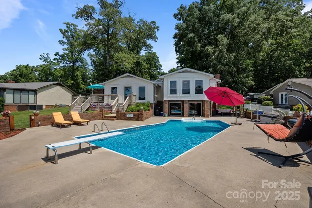 swimming pool with outdoor seating