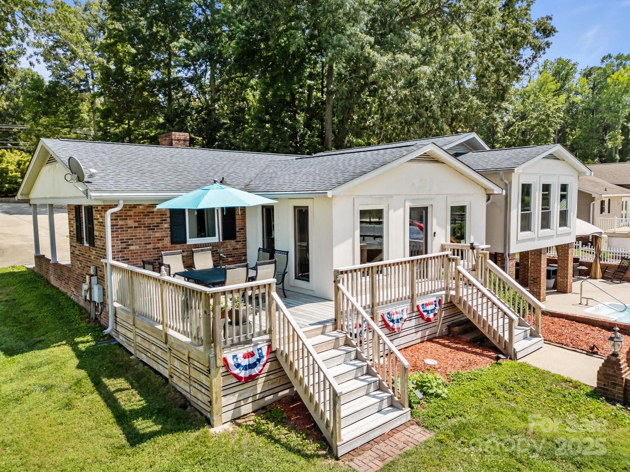 1017 Holloway Church Road Lexington, NC 27292 - Photo 35 of 48 an aerial view of a house with roof deck front of house