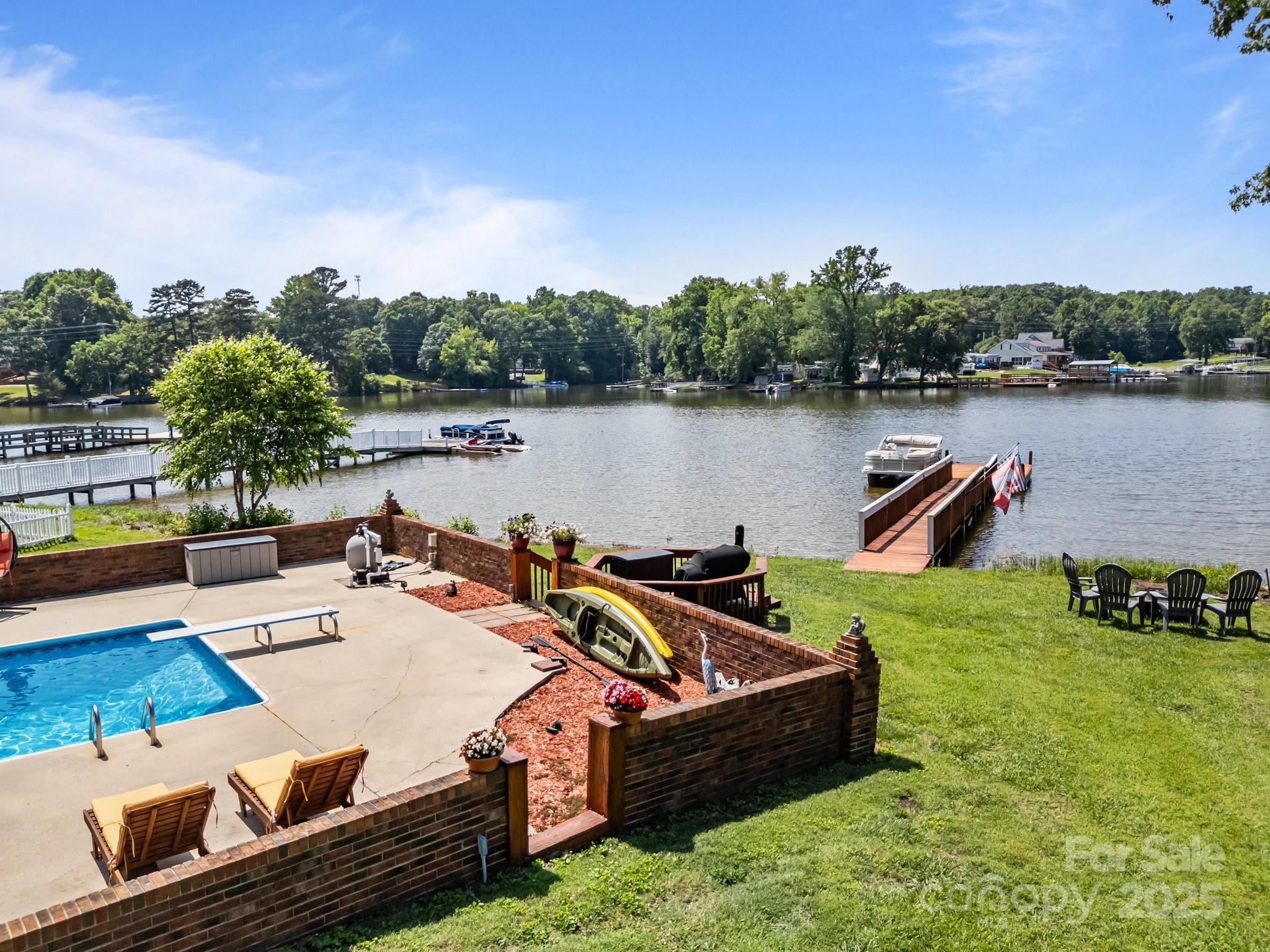 1017 Holloway Church Road Lexington, NC 27292 - Photo 41 of 48 a view of a lake with couches in front of house