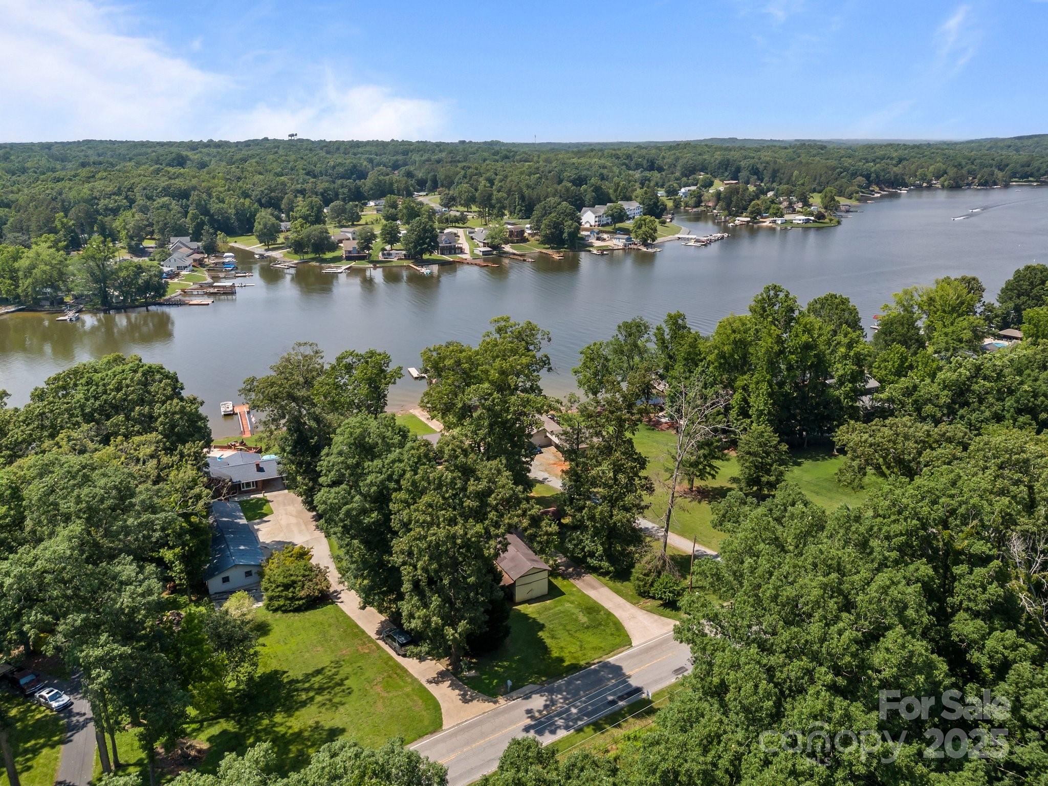 1017 Holloway Church Road Lexington, NC 27292 - Photo 48 of 48 an aerial view of residential houses with outdoor space and lake view