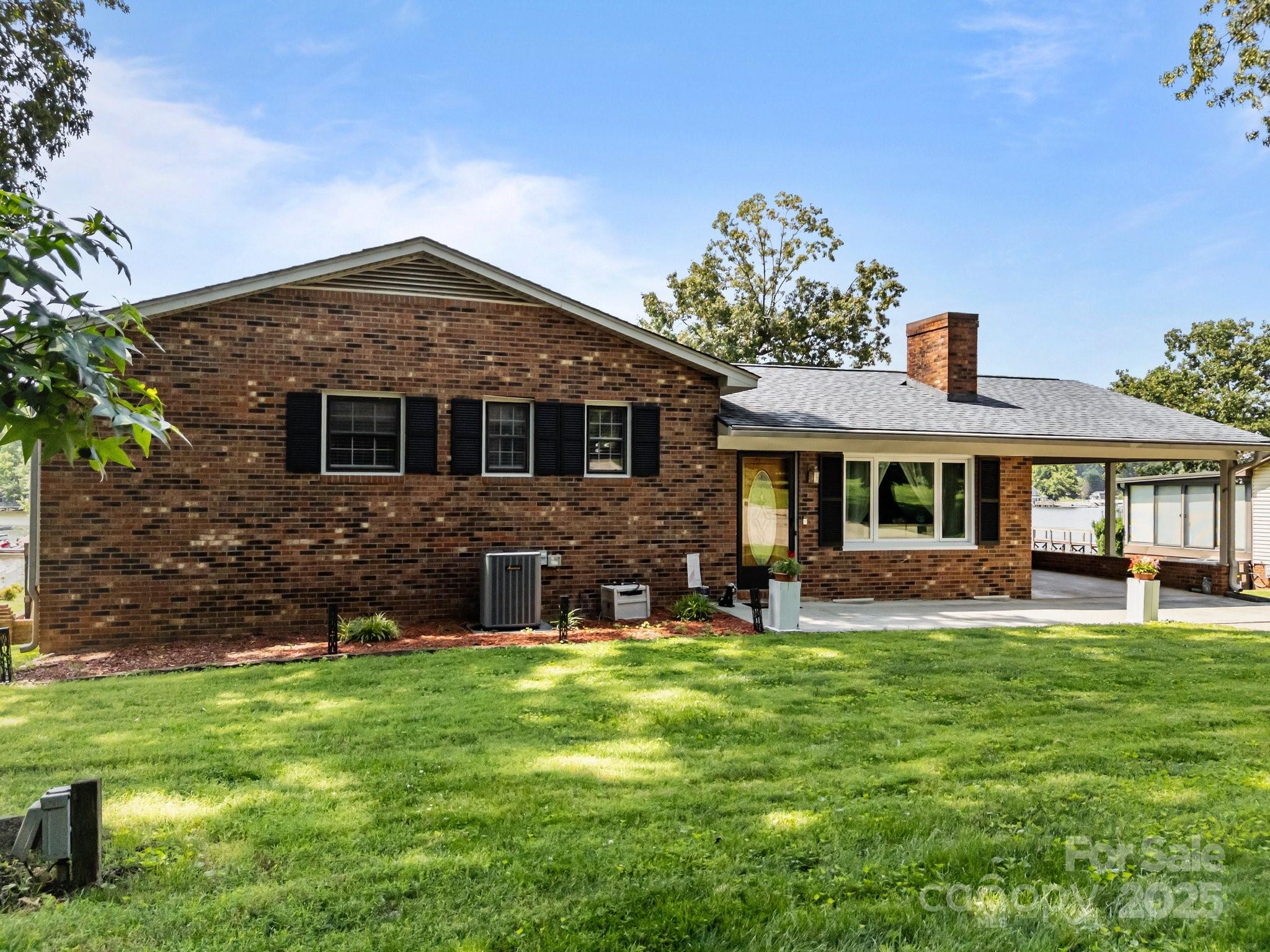 1017 Holloway Church Road Lexington, NC 27292 - Photo 5 of 48 a front view of a house with garden