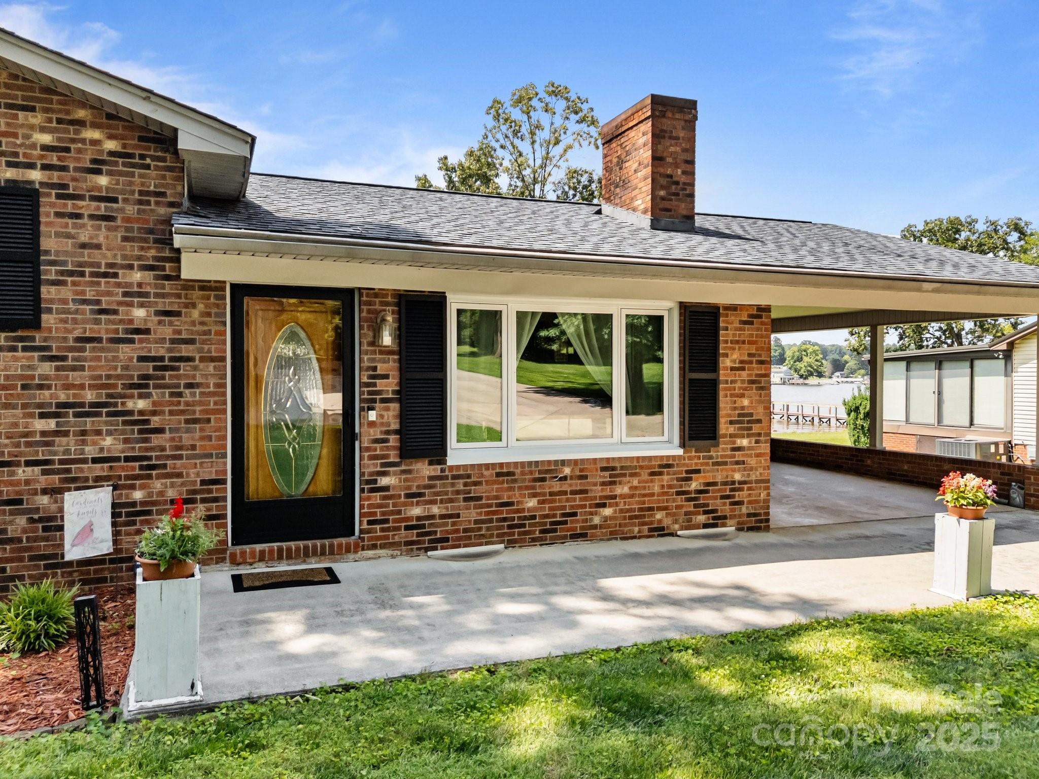 1017 Holloway Church Road Lexington, NC 27292 - Photo 7 of 48 a front view of a house with garden