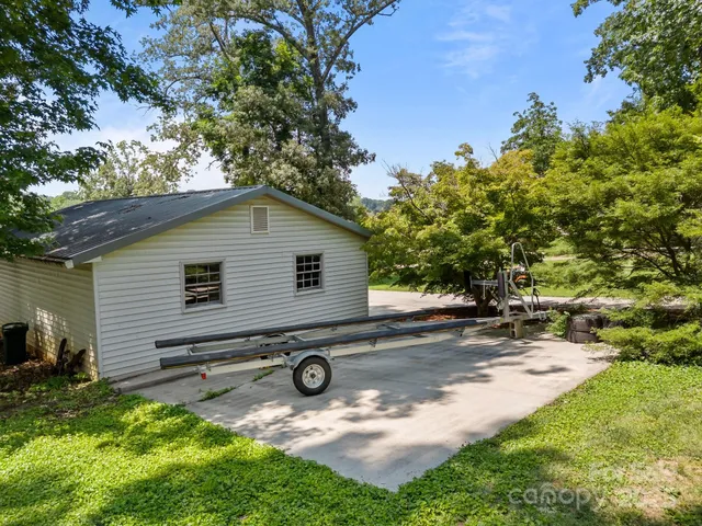a view of backyard with a garden and entertaining space